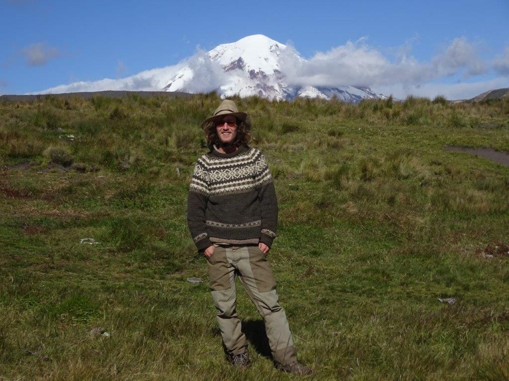Photo of person in front of Mount Chimborazo